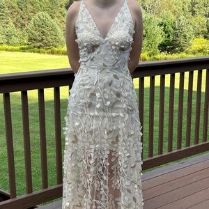 Cream formal dress with gold accents